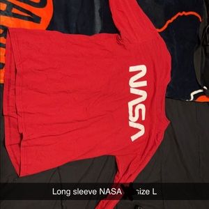 NASA long sleeve shirt size L. All the country’s flags down the sleeves.
